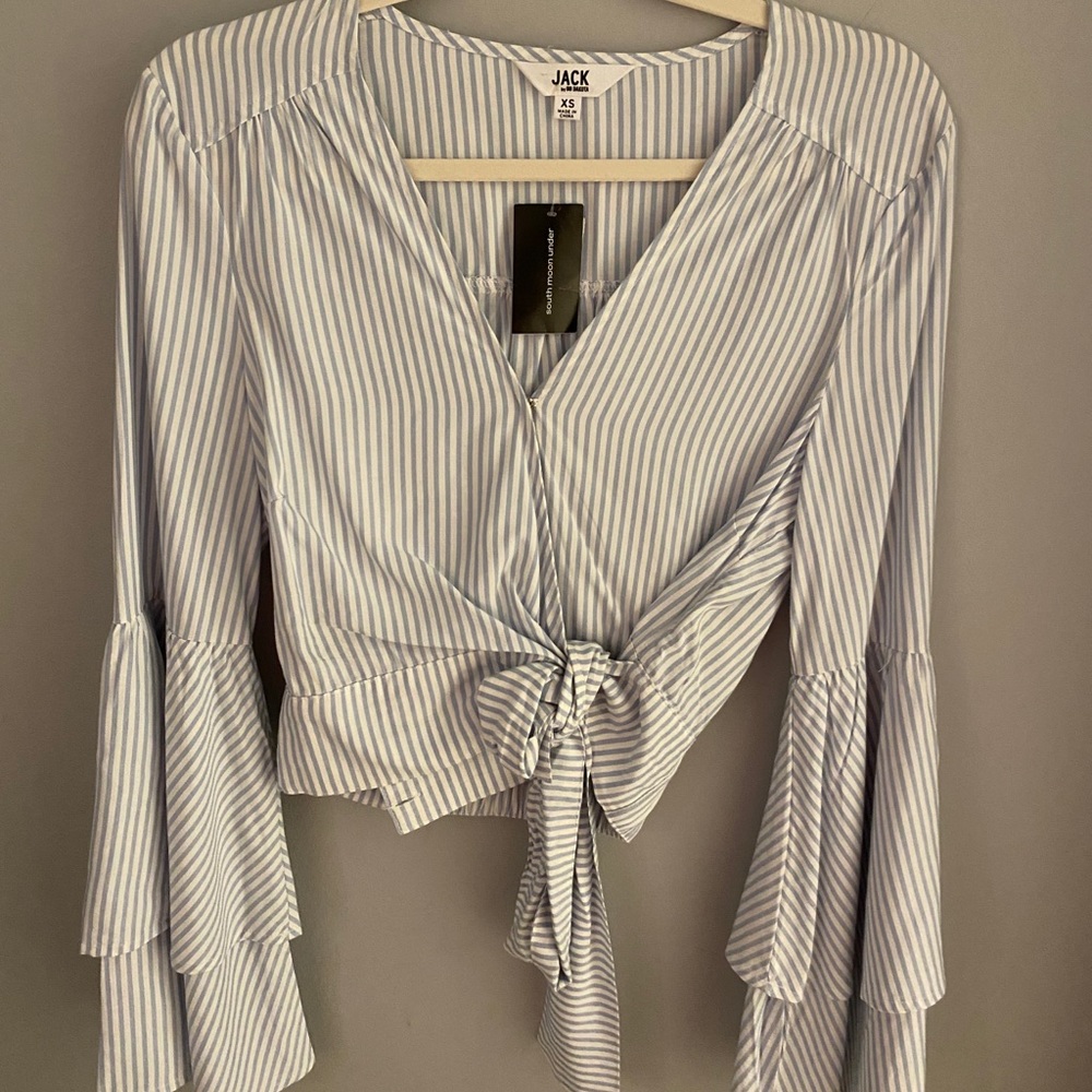 blue and white tie up shirt with big sleeves